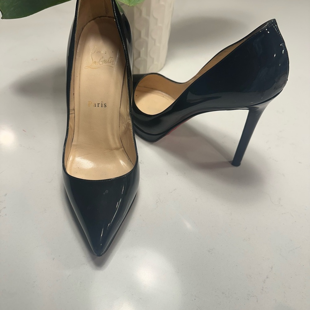 Louboutin heels. size 9 US , black stiletto/ comfortable heels